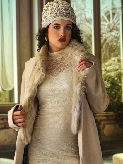 A classic, elegant room with large windows, created with projection. The soft, natural-looking light from the projected windows provides a beautiful and sophisticated illumination for this vintage-inspired look.