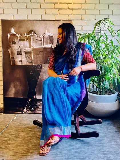 Our founder, Rachna Agarwal, celebrating heritage and tradition in the studio. This reflects our deep appreciation for culture, which often informs the narratives and aesthetics of the spaces we design.