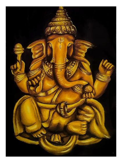 Another view of the golden Ganesha rangoli. This image highlights the intricate details on the crown and trunk, all meticulously crafted using coloured powders to achieve a realistic, embossed look.