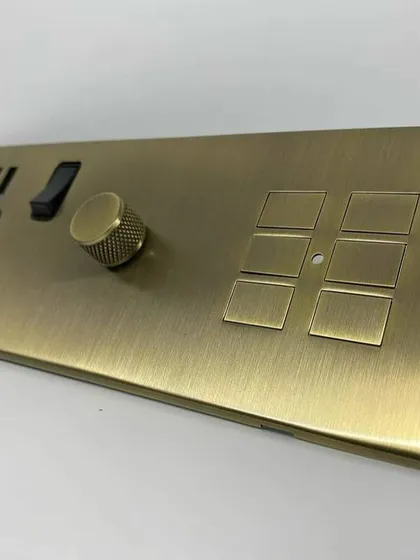 For clients who want fully custom solutions, I can design and install bespoke switch panels like this one from Rako. It combines smart scene buttons, a dimmer, and a standard socket in a single, elegant brass plate.