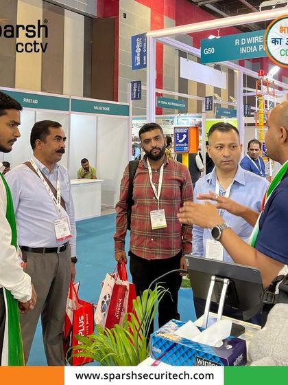 We are passionate about creating a safer tomorrow. Our team engages with visitors at the Traffic InfraTech Expo, explaining our AI-powered traffic management solutions.