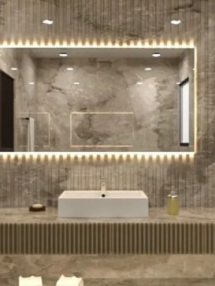 A concept for a spa-like bathroom with a large backlit mirror, vessel sink, and built-in shelving.