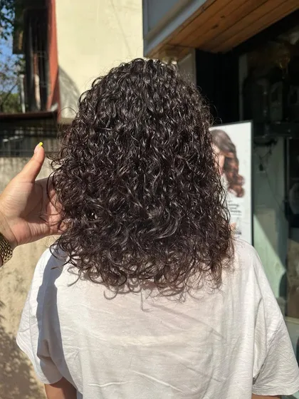Another look at these gorgeous, healthy permed curls. My focus is on creating natural-looking texture and volume that you can easily manage at home.