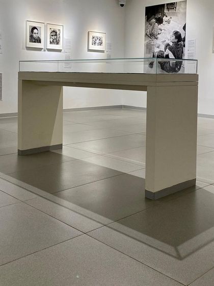 The play of light and shadow in a gallery at the Museum of Art and Photography (MAP). The lighting is designed to be precise and functional for the art, while also creating a calm and contemplative atmosphere in the space.