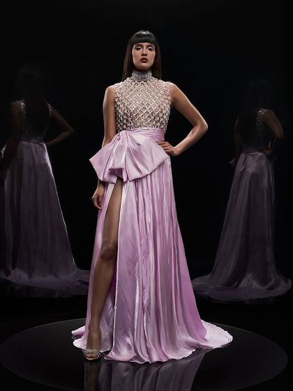 A stunning shot of a lilac pink gown by Alpana Neeraj, using reflections to create a hall-of-mirrors effect.