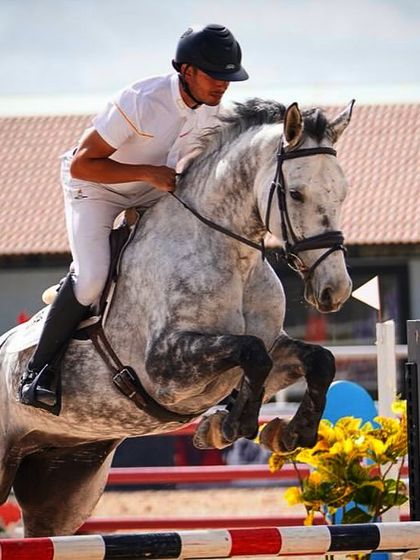 Another angle of Nikolay and our home bred mare Catharina in action. Her powerful jump and excellent technique are clear to see.