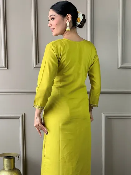 This lemon viscose chanderi kurta is so fresh and vibrant. The heavy thread embroidery and printed dupatta make it a cheerful addition to your ethnic wardrobe.