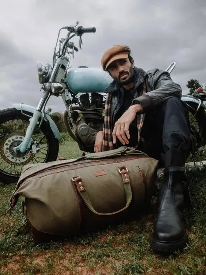 Styling for the Loki Craft India campaign, a brand focused on rugged leather goods. The concept was built around a vintage adventure feel, using a classic motorcycle and natural outdoor setting to showcase the product's durability and style.