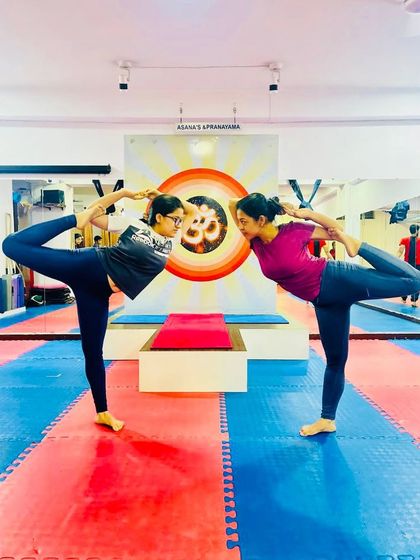 A partner variation of Natarajasana, the Lord of the Dance Pose. Practicing face-to-face helps with balance and creates a shared point of focus.