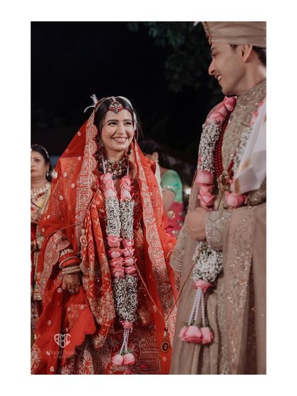 The genuine smiles and shared laughter during the wedding rituals are the moments that truly define your story. We focus on capturing these candid interactions that show your authentic connection.