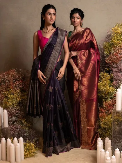 Our collection offers a saree for every personality and wedding event. Here, we feature two distinct Kanjivaram sarees: a deep purple with Banarasi motifs and a classic maroon brocade, each telling its own story of heritage.