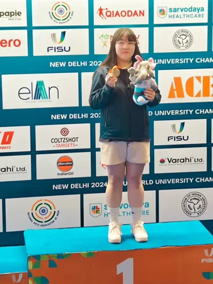 The podium for the Final 25M Pistol Women event. We provide a stage for female athletes to shine and inspire others with their achievements.