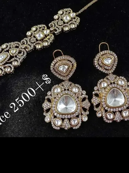 A Parineeti-inspired earring and maang tikka set. This simple yet elegant rental is perfect for a minimalist look or for a pre-wedding event.