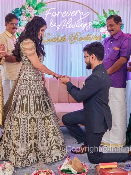 A duplicate of image 25, capturing the proposal during an engagement ceremony. This ensures the moment is documented from multiple perspectives for a complete story.