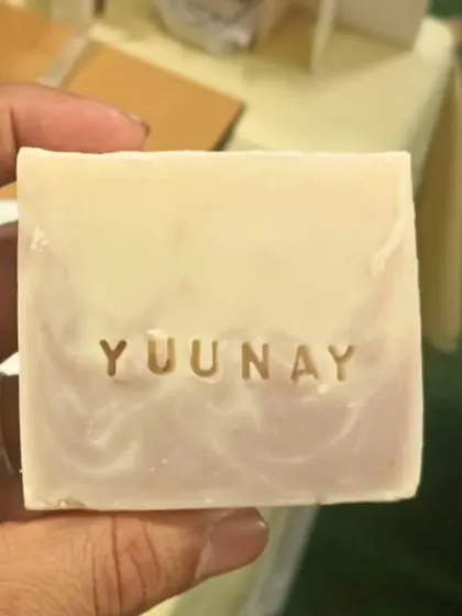 A custom name stamping on a bar of my soap at a fair. It's a fun way to make your purchase extra special.