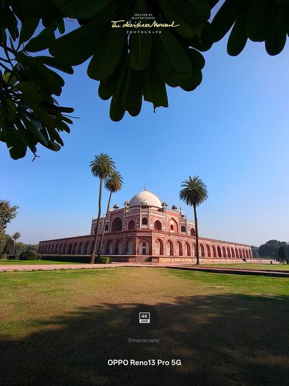 A crisp, clear shot of Humayun's Tomb taken with the OPPO Reno13 Pro. The "4K Enhance Clarity" feature is highlighted, showing how I can focus on specific technical advantages in my brand content.
