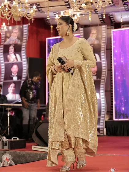 Captured in motion on the red carpet. My work begins the moment guests arrive, setting a welcoming and professional tone for the entire evening.