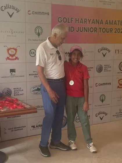 Aadya Kaushal receives her 3rd place medal at the Golf Haryana tour.