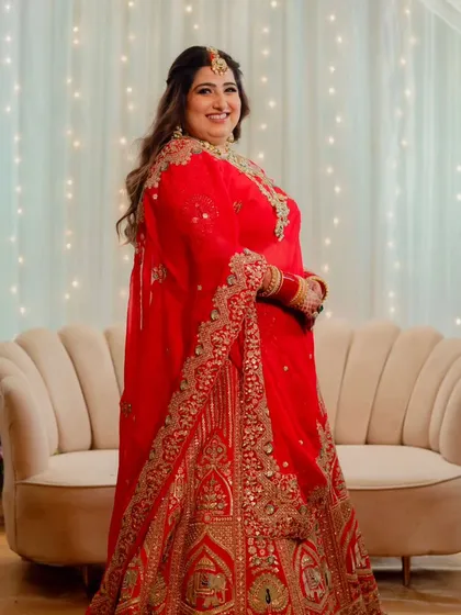 A collection of moments from this bride's reception. Her look was all about soft glam, with flowing waves and makeup that highlighted her joyful smile, creating a perfect look for her evening celebration.