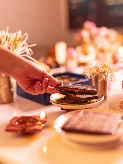 A close-up of our Bombay Kaju Krunchy Bar, a unique creation that blends traditional and modern flavors.