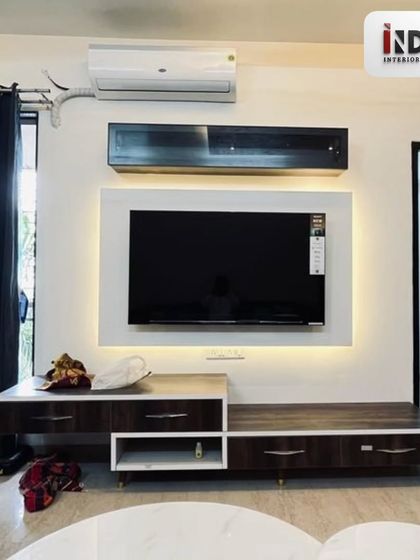 A different angle of the TV unit, showing its sleek, floating design that makes the room feel more spacious.