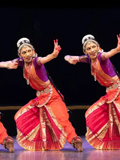 The energy of a group performance is electric. This image captures the 'maja' of playing a gopa, showcasing the synchronized and dynamic movements I choreograph for group productions. Whether for a solo artist or an ensemble, I aim to create a powerful visual narrative.