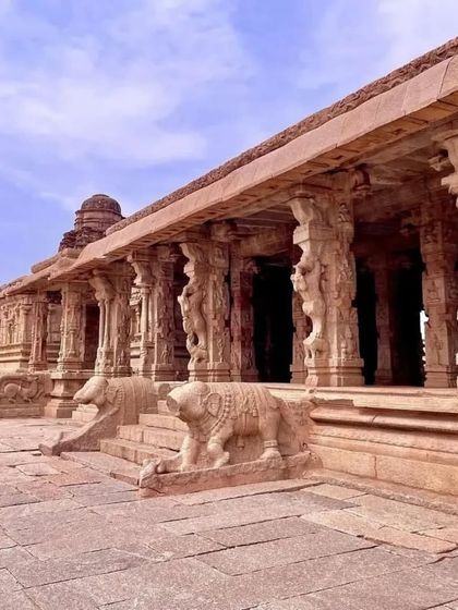 The intricately carved pillars of the Vittala Temple complex in Hampi, a masterpiece of ancient Indian architecture.