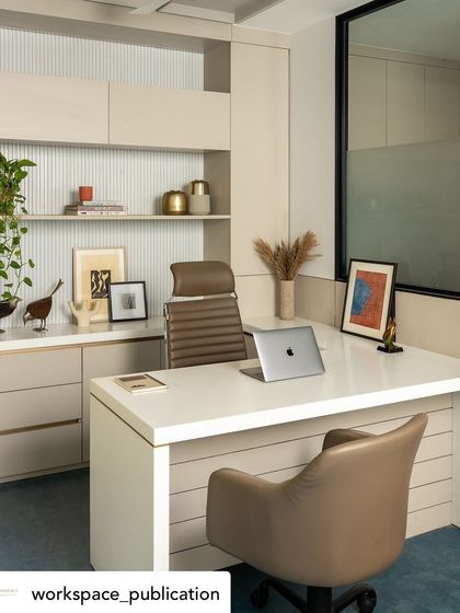 The MD's desk is positioned for productivity, with integrated storage, ample surface space, and task lighting, all within a calming, neutral color palette.