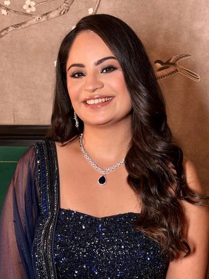 Shweta's happy smile completes her glamorous party look.