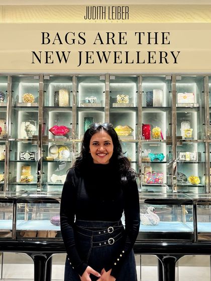 Bags are the new jewelry! I believe a statement bag can be the centerpiece of an outfit. Here I am at the Judith Leiber store, surrounded by wearable art.
