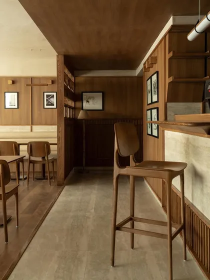 A view of the bar and seating, showing the clean, linear design.