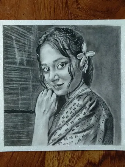A beautiful portrait of a woman in traditional dress with a flower in her hair, creating a very artistic feel.