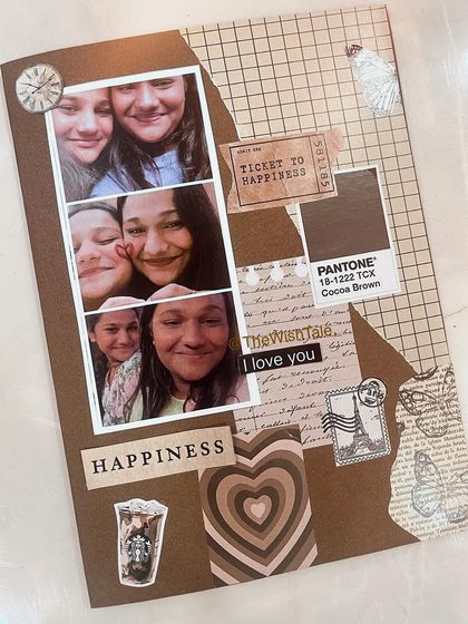 A close-up of a handmade scrapbook card with a brown color palette. I used different textures, a Pantone color chip, and cute stickers to create this "ticket to happiness."