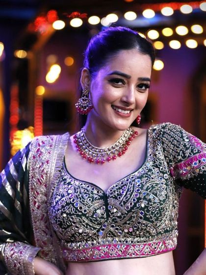 A close-up of the stunning blouse from my Vibrant Blossom lehenga. The intricate details and modern twist make it a true work of art.