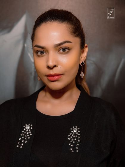 A slight variation of the beauty shot, with a subtle shift in expression, providing options for a portfolio or campaign.