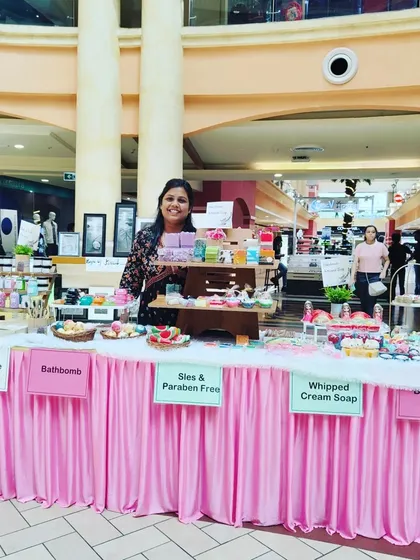 Another shot of me at my exhibition stall, surrounded by all my handmade creations.