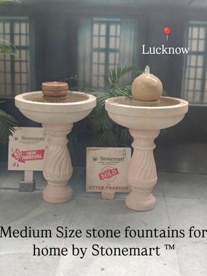 A pair of medium-sized stone fountains suitable for a home entrance or balcony. These pedestal designs also function as birdbaths.