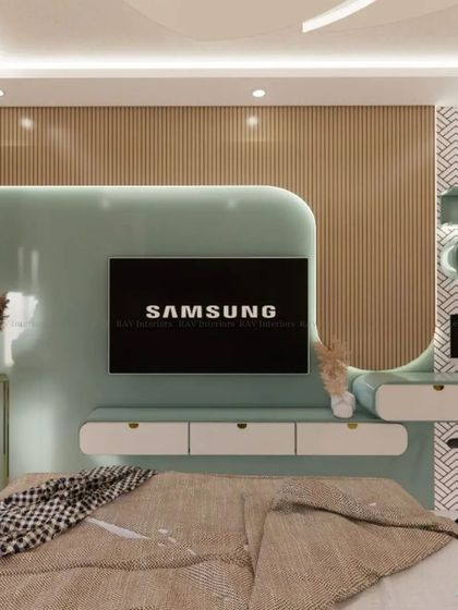 A view of the TV and study unit in the mint-green themed bedroom, showcasing a cohesive and functional design.