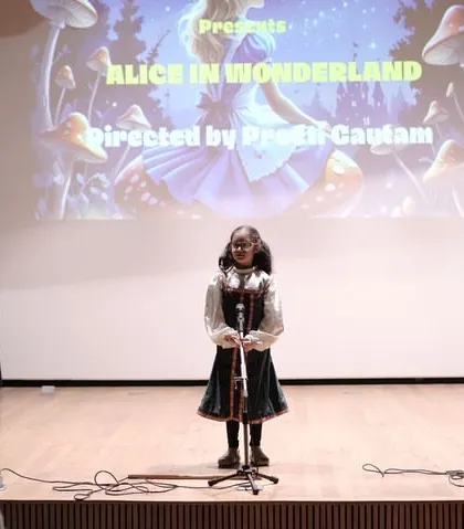 Three of our actors take their positions on stage for 'Alice in Wonderland'. This demonstrates their understanding of stage blocking and presence, ensuring the audience can see and connect with each character.
