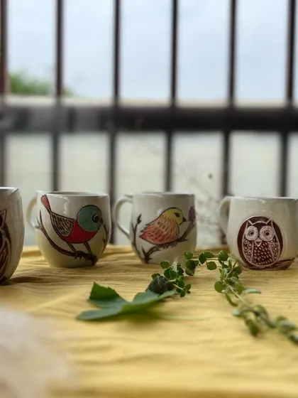 After the clay, the wheel, and the fire, this is the magic that comes out of the kiln. I feel so happy seeing these hand-painted bird mugs come to life with such character. Each one tells its own little story.