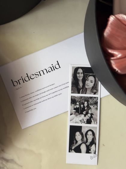 A heartfelt way to ask "Will you be my bridesmaid?". This card defines what a bridesmaid means to you, paired with a custom photo booth strip of your favorite moments together.