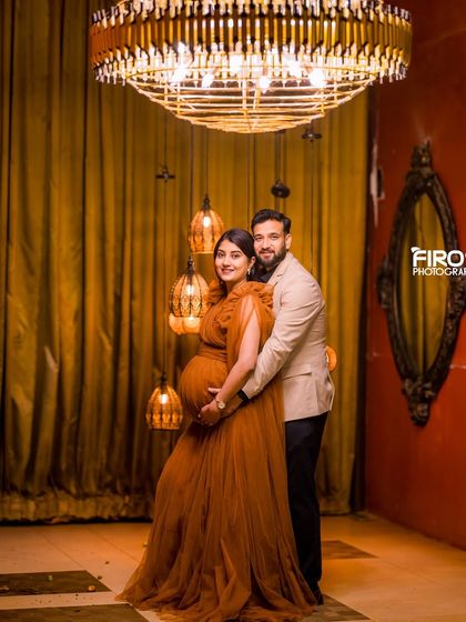 Our indoor set with a grand chandelier and Moroccan lamps offers a royal and opulent setting for elegant maternity or pre-wedding photos.
