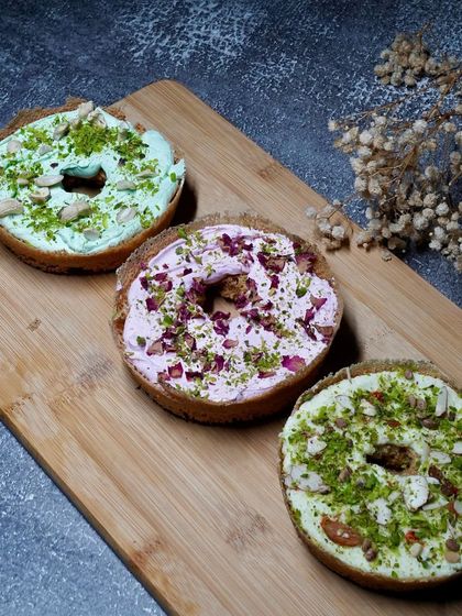 The traditional Ghewar, now with a twist. Here are our three most popular flavours: fragrant Rose, nutty Pista, and classic creamy Malai. There's a flavour for every Ghewar paglu.