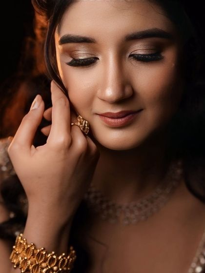 An eyes-closed shot to showcase the soft, shimmery eyeshadow work.