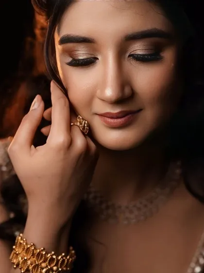 An eyes-closed shot to showcase the soft, shimmery eyeshadow work.