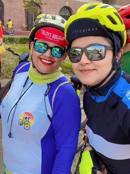A selfie of two female cyclists. The friendship and support among our members are incredible.