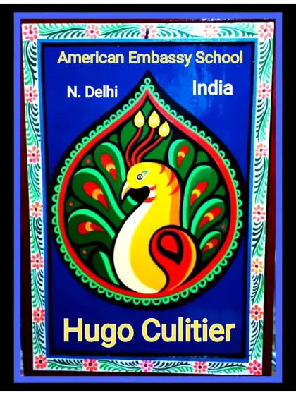 A custom nameplate for a client at the American Embassy School in New Delhi. The design features a stylized peacock, a classic Indian motif, painted in vibrant colors.