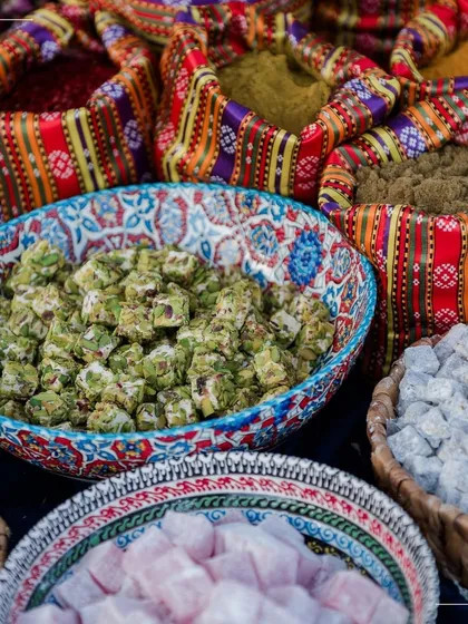A beautiful display of Turkish delights and local spices. For destination events, we create setups that are not just food stations but cultural experiences.