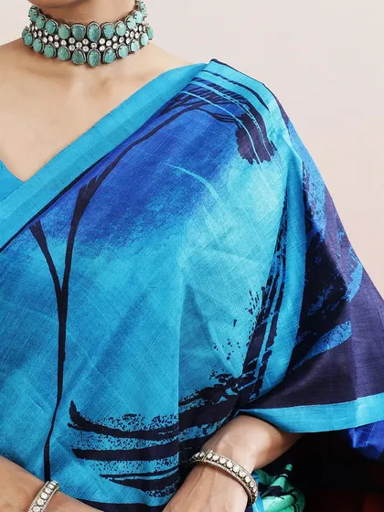A close-up of the abstract brushstroke pattern on the saree, highlighting its artistic and modern appeal.