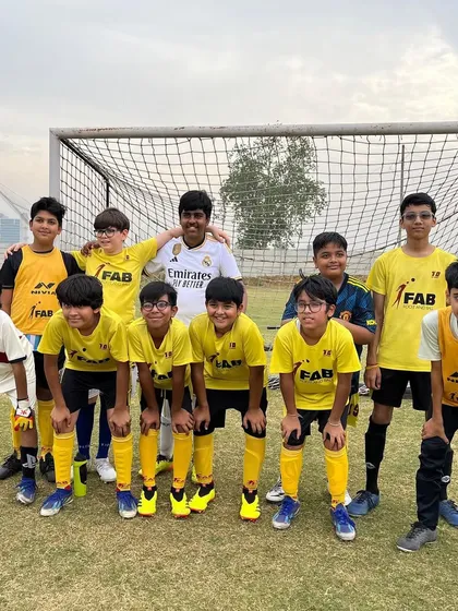 A team photo before a friendly match. We prepare our players for effective teamwork and future challenges.
